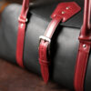 Premium Vegetable-Tanned Full Grain Black/Bordeaux color Leather Weekender Bag. Heavy duty Brass and Copper Hardware.