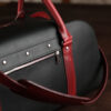 Premium Vegetable-Tanned Full Grain Black/Bordeaux color Leather Weekender Bag. Heavy duty Brass and Copper Hardware.
