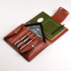 a leather journal for A5 notebooks or sketchbooks with three pen loops and two large pockets for tools and gadgets.